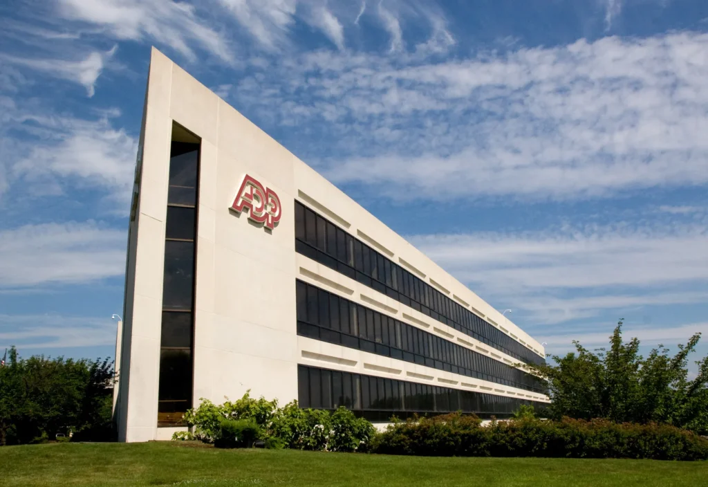 ADP corporate office building exterior representing global payroll and HR services company