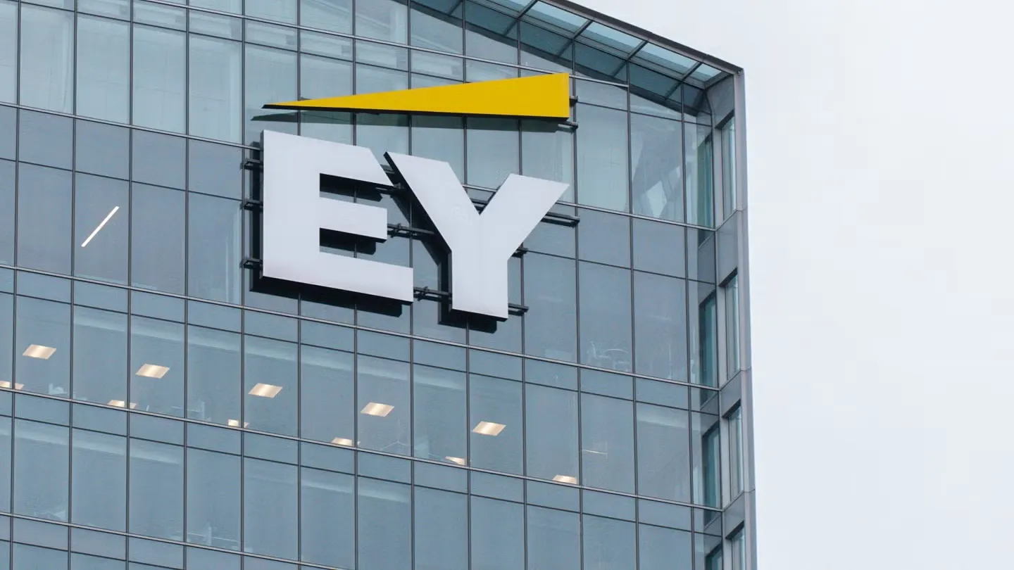 EY office building with Ernst & Young logo displayed on corporate headquarters