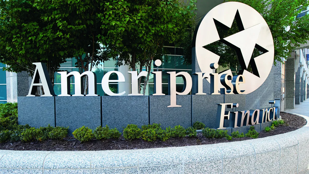 Ameriprise Financial office sign with star logo outside corporate building