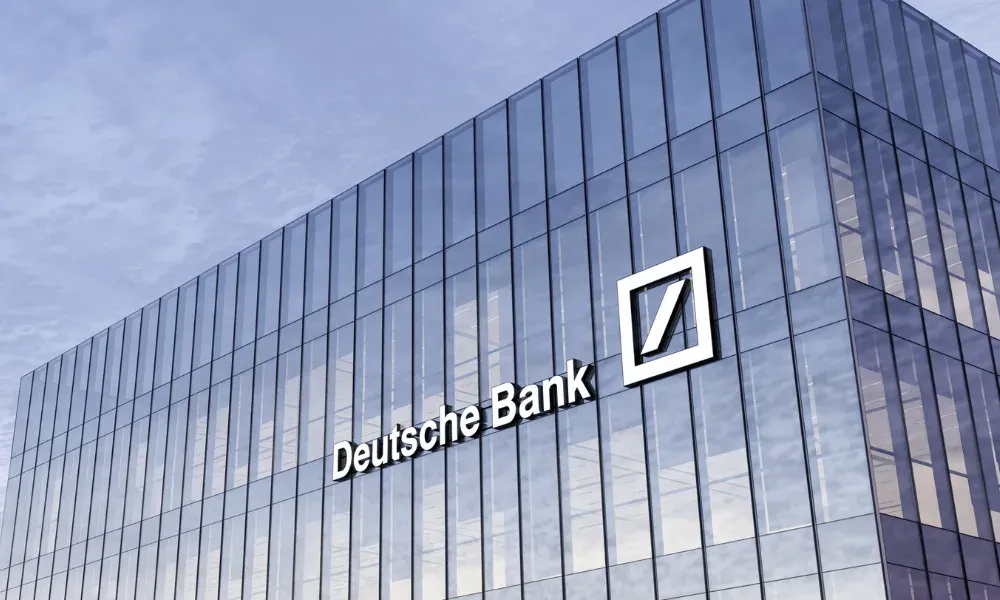 Deutsche Bank logo displayed on glass office building exterior