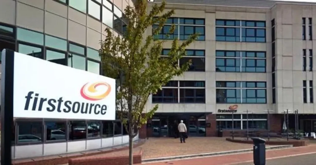 Firstsource office building exterior with company logo signage at entrance