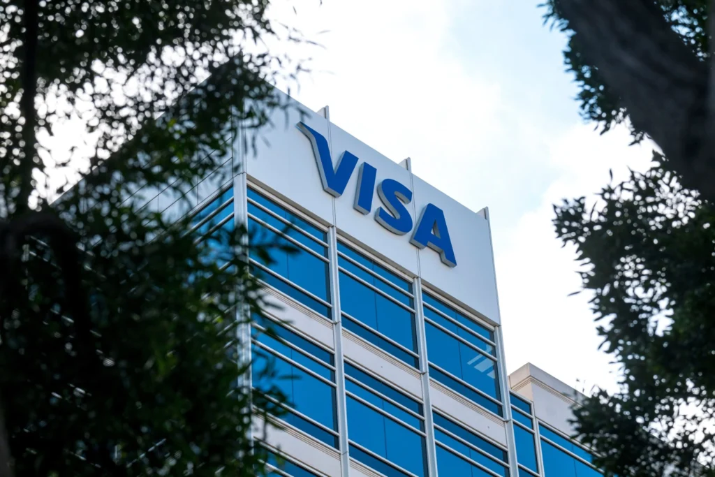 Visa logo displayed on modern office building exterior