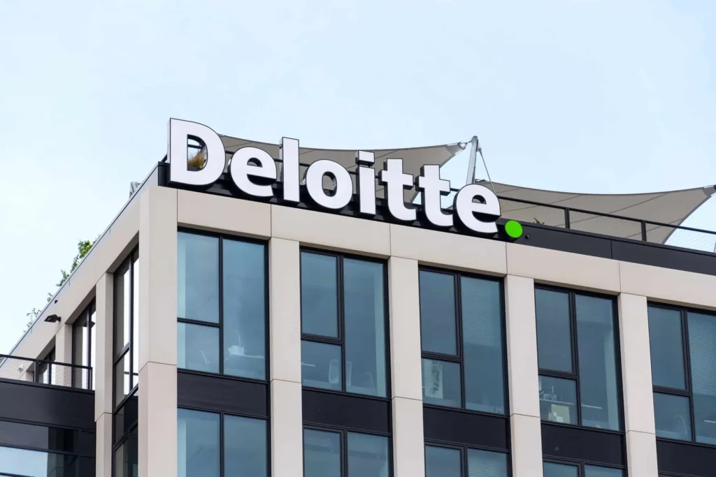 Deloitte office building exterior with company logo signage
