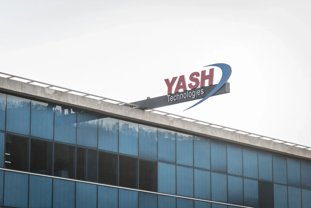 YASH Technologies office building exterior with company signage